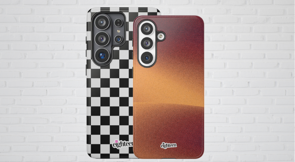 2 Samsung Galaxy S series phones, a black and white checkerboard print and an orange and burgundy gradient print, against a white brick wall. 