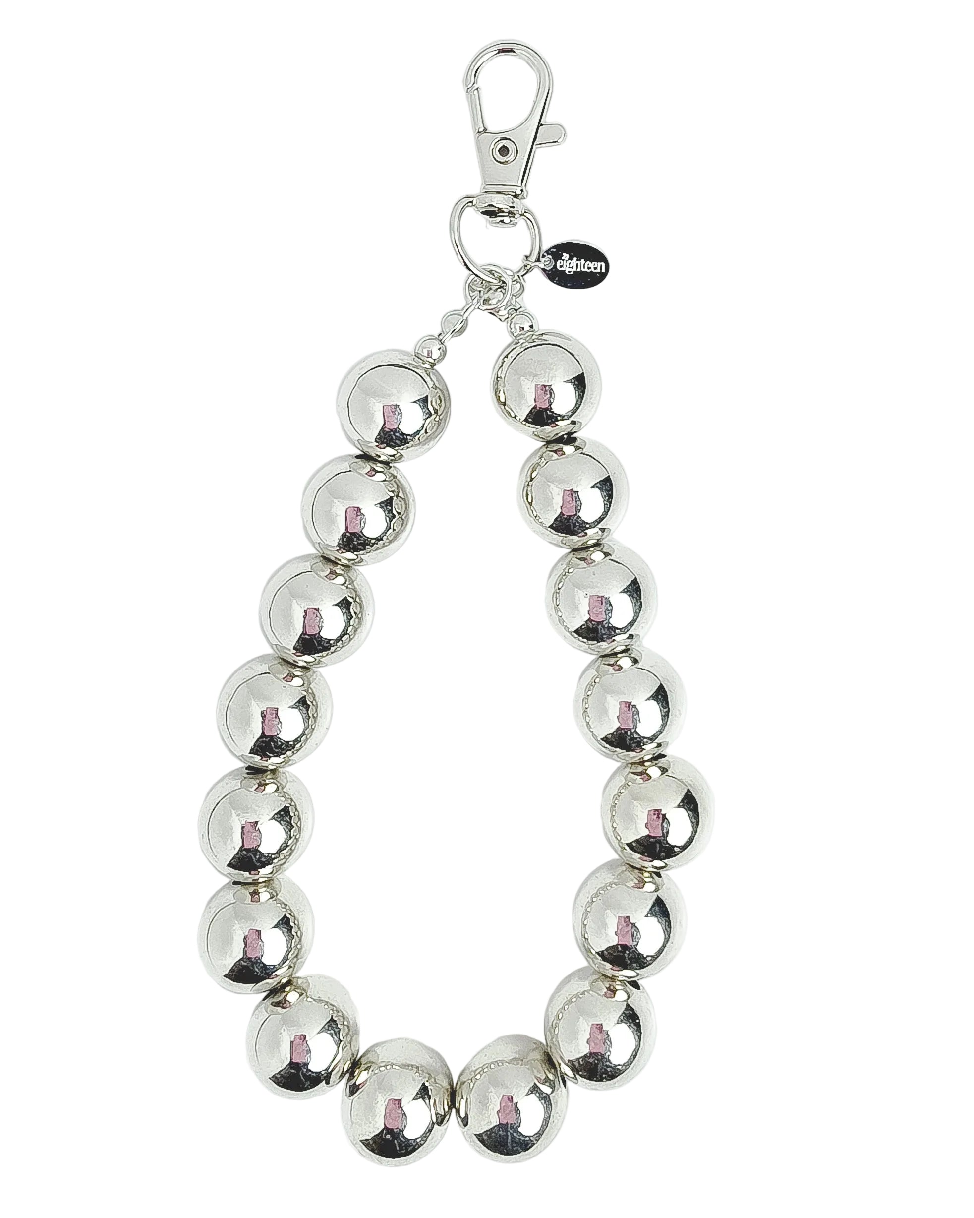 Silver bauble phone wristlet