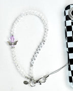 Clear, crystal beaded phone charm with lavender & silver angel bead motif and white round beads with silver letters that spell out "Forever" attached to a black and white checkered phone case