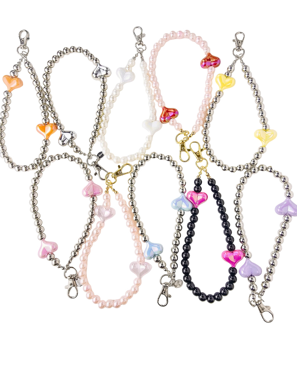 Four beaded phone strap chains arranged on a light gray background. The set includes silver, pearl white, pale pink, and black beads, each decorated with translucent heart-shaped charms in pink, yellow, orange, blue, purple, and red.