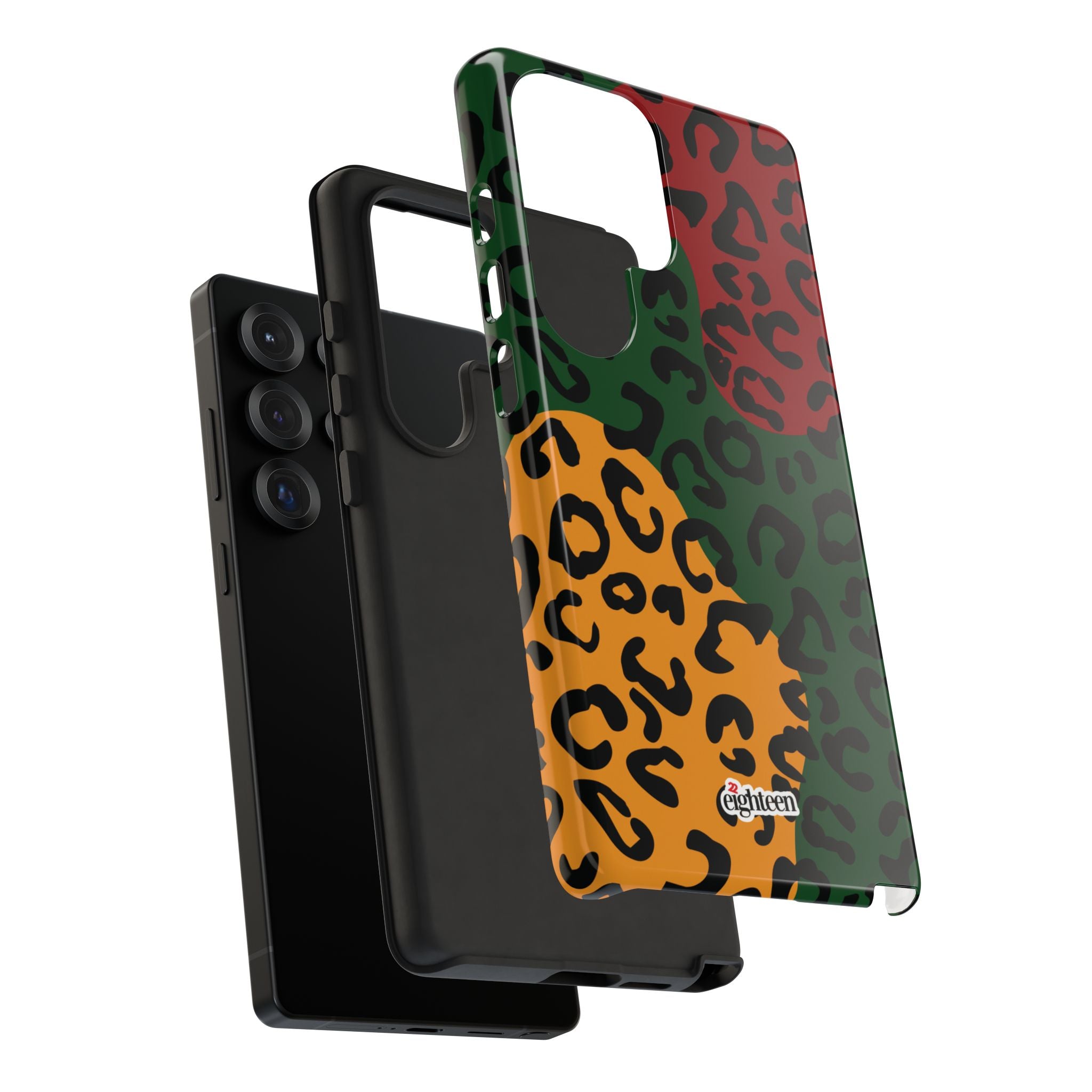 Expanded Phone case with green, red and yellow leopard print pattern, separated from its rubber interior wrap on a white background
