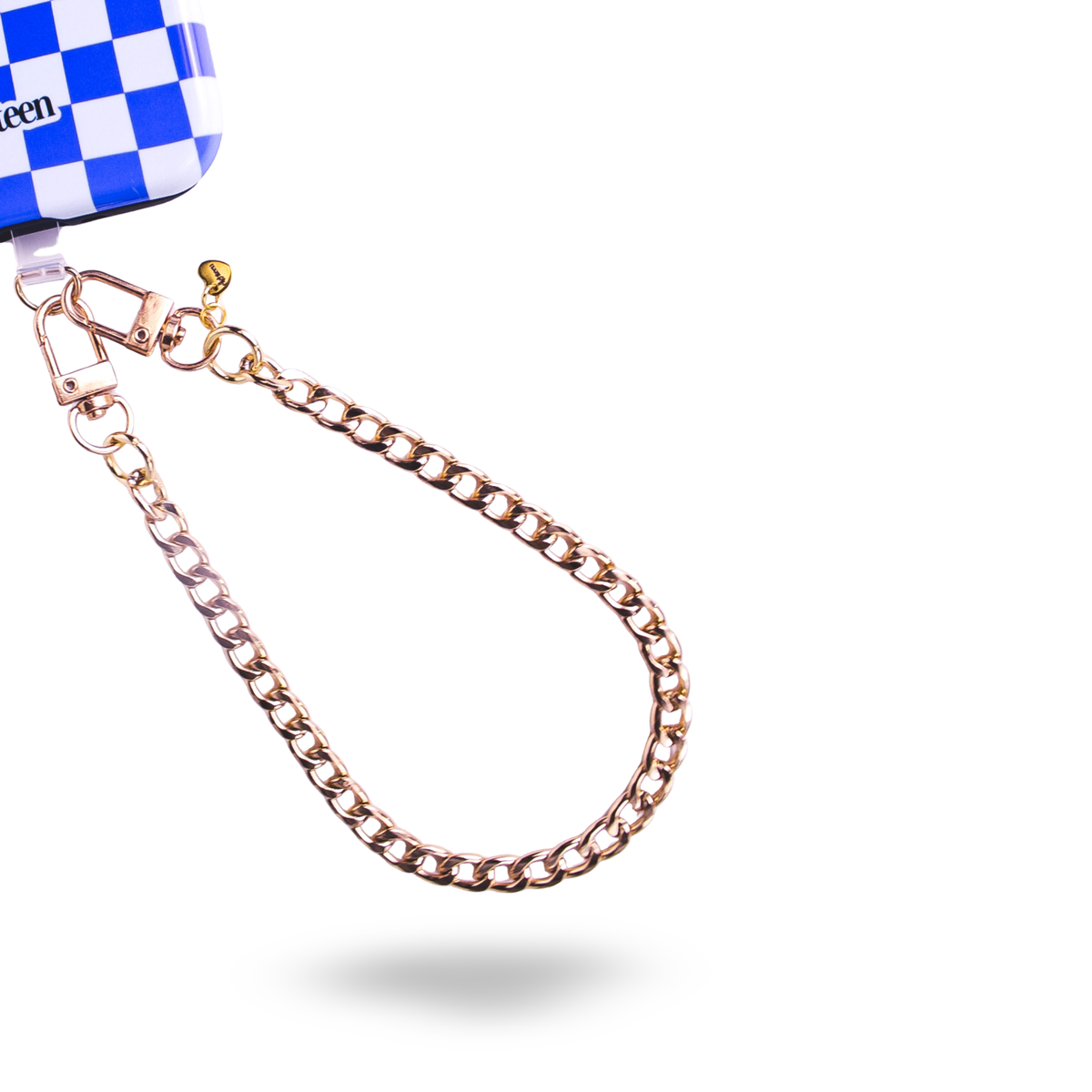 A rose gold metal chain strap with a lobster clasp, shown attached to a blue and white checkered bag corner on a plain white background.