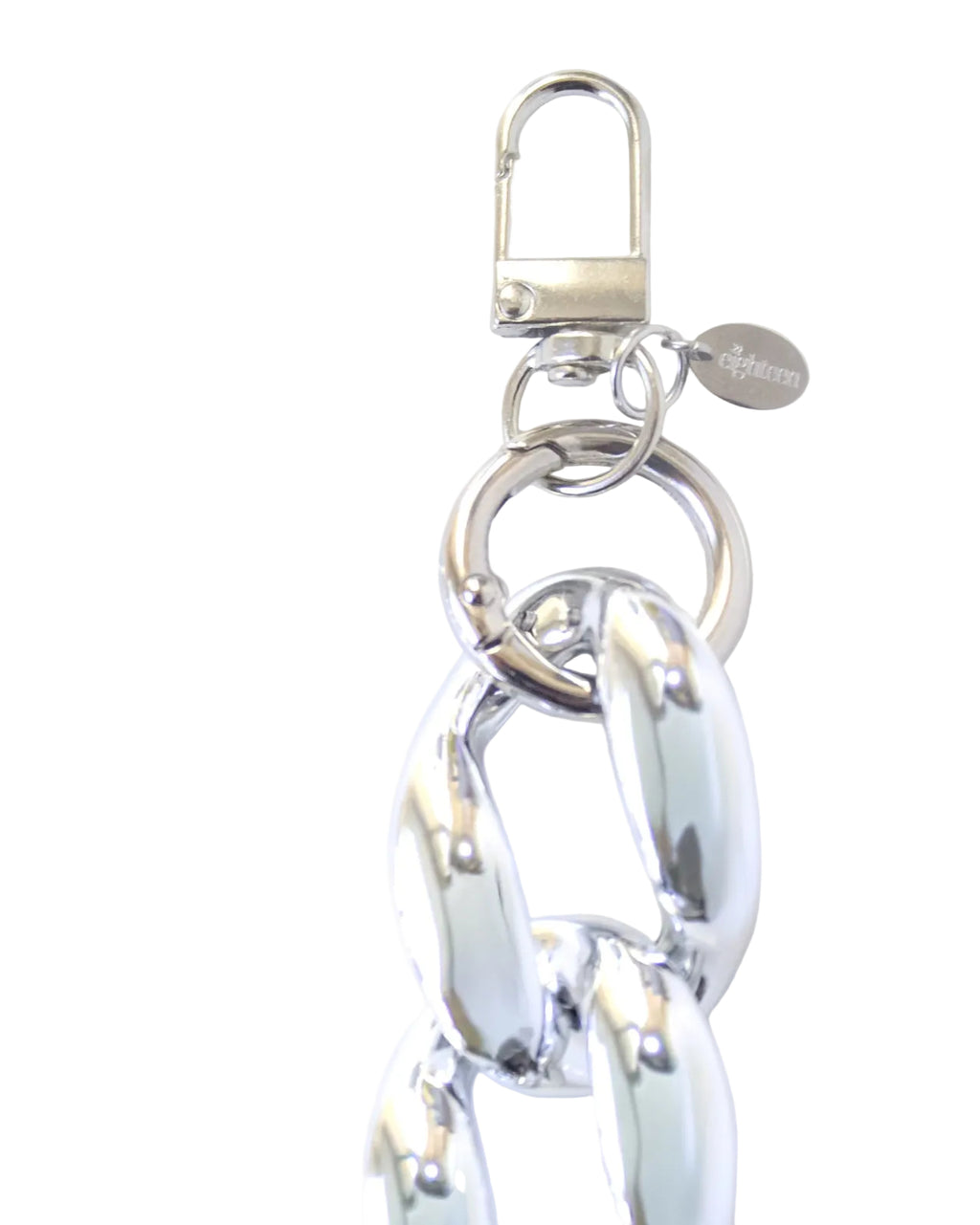 A silver-tone metal lobster clasp, carabiner ring, a small silver tag that says, "22Eighteen" and chunky interlocking chain links on a plain white background.