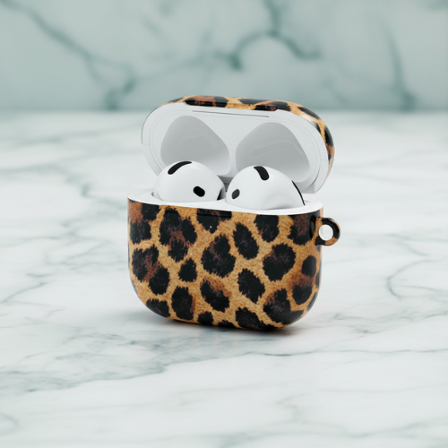 Leopard print case for wireless earbuds on a marble surface
